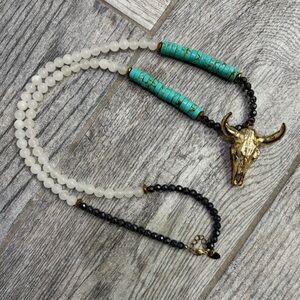 BPD gold bull necklace